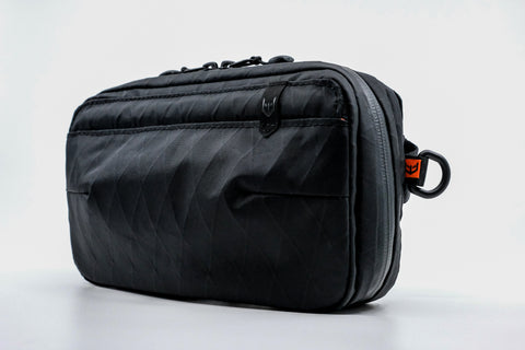 An Alpha Pack from the front at three quarter angle  | Color: Black VX | Size: 1.8L