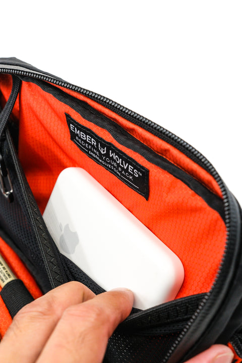 Alpha Pack interior close up showing MagSafe battery pack attached | Color: Black VX | Size: 1.8L