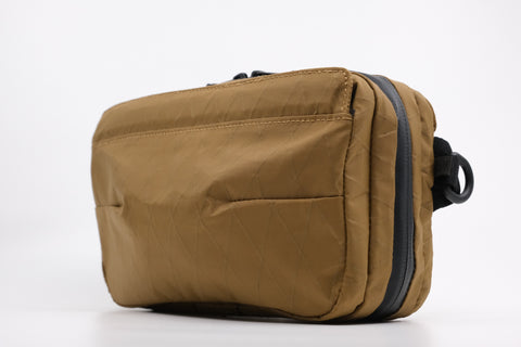 An Alpha Pack shown from the front three quarters  | Color: Brown VX | Size: 1.8L