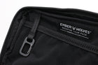 An Alpha Pack inside detail zoomed in on the tag | Color: Brown VX | Size: 1.8L