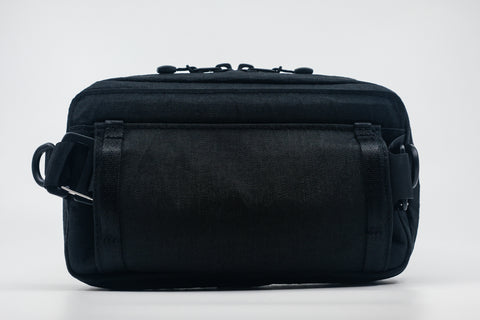 An Alpha Pack shown from the back  | Color: Tactical Black | Size: 1.8L