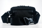 An Alpha Pack from the back with strap and Fidlock buckle | Color: Tactical Black | Size: 1.8L