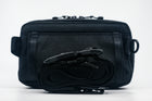An Alpha Pack from behind with strap and buckle rolled up.  | Color: Tactical Black | Size: 1.8L