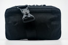 An Alpha Pack shown from the front with Fidlock buckle. | Color: Tactical Black | Size: 2.6L