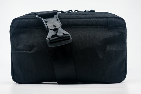 An Alpha Pack shown from the front with Fidlock buckle. | Color: Tactical Black | Size: 2.6L