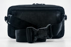 An Alpha Pack with an adjustable black webbing strap and fidlock buckle | Color: Tactical Black | Size: 2.6L