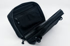 An Alpha Pack displaying its internal compartments. | Color: Tactical Black | Size: 2.6L
